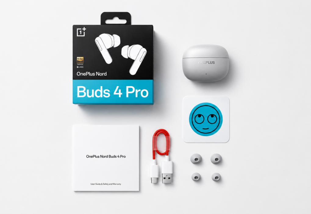 OnePlus Nord Buds 4 Pro retail box, charging case, USB Type-C cable, ear tips, and user manual arranged neatly on a clean white background.