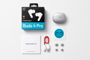 OnePlus Nord Buds 4 Pro retail box, charging case, USB Type-C cable, ear tips, and user manual arranged neatly on a clean white background.